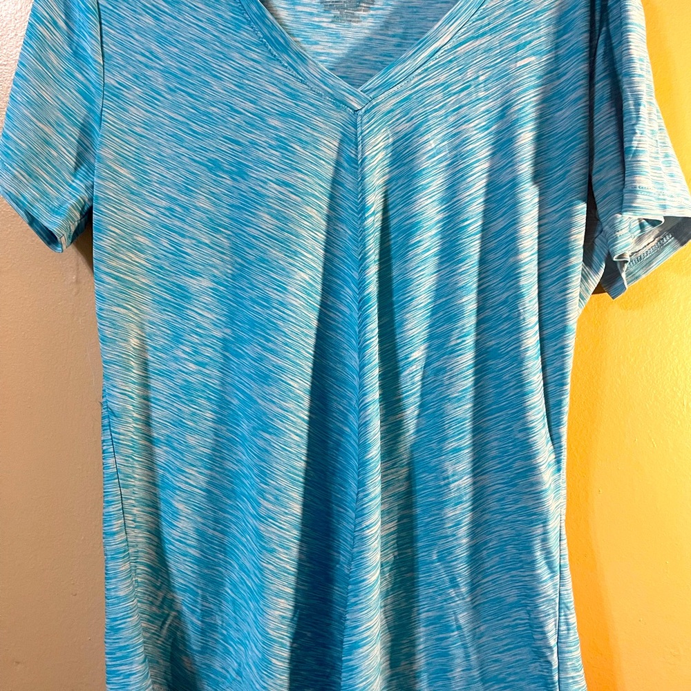 Two shirts that have no holes, no bleach spots, good shape.